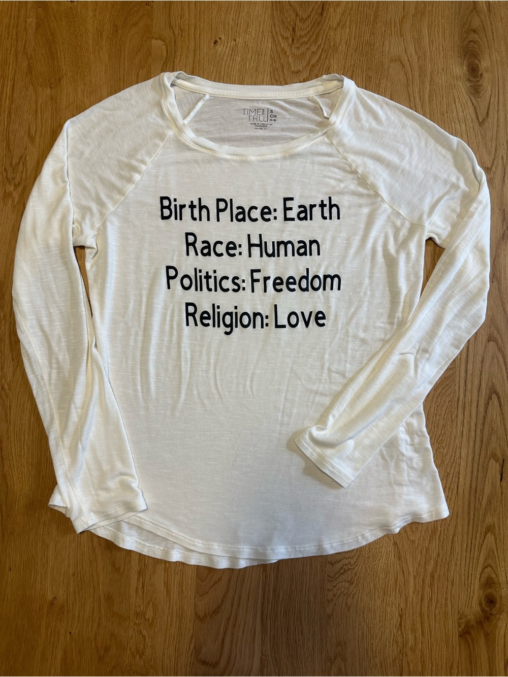 White Long-Sleeve Graphic Tee - Birth Place: Earth